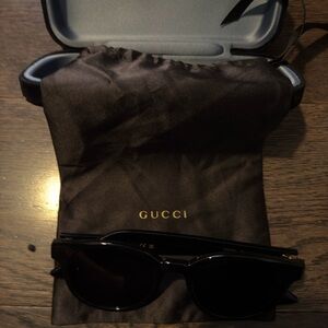 Gucci Dark Sunglasses with Gold Accents